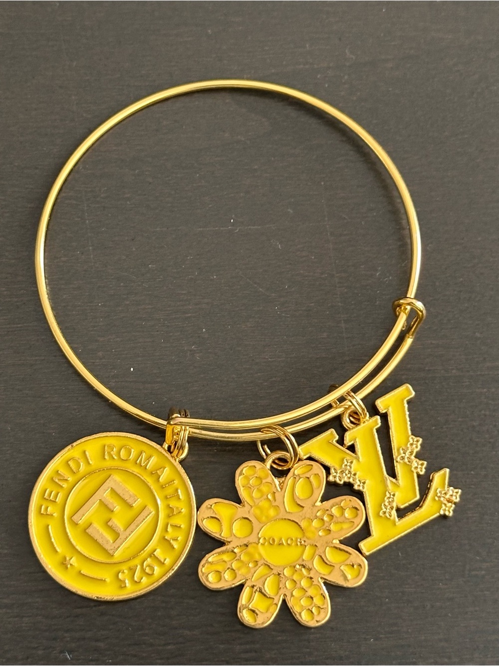 Gold-Tone Bracelet with Yellow Enamel Charms